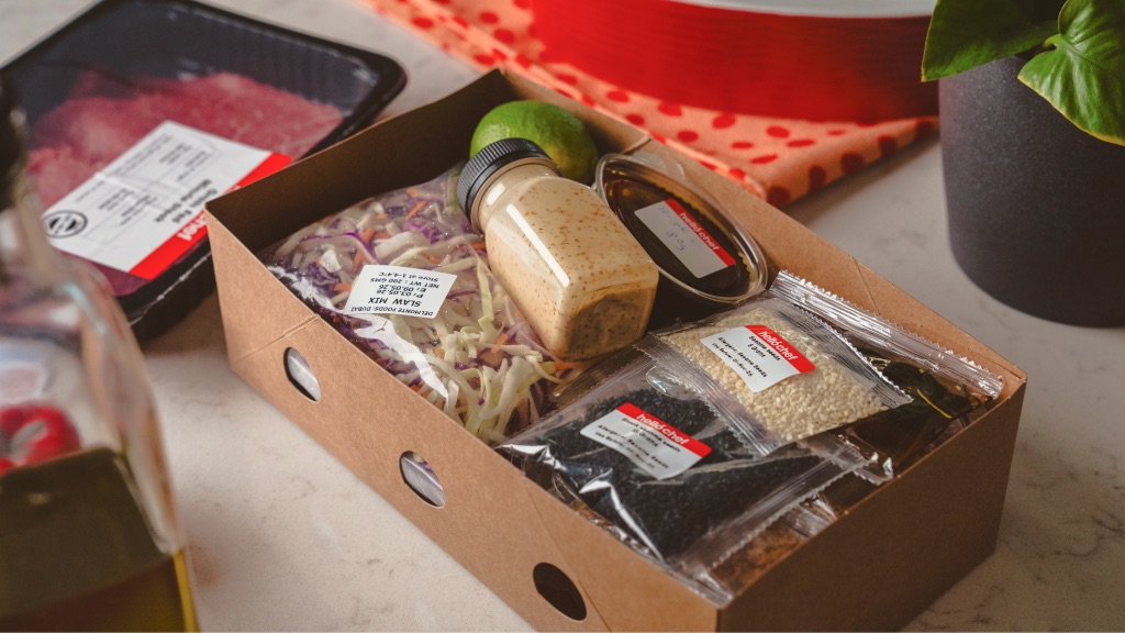 A Hello Chef box packed with fresh, portioned ingredients
